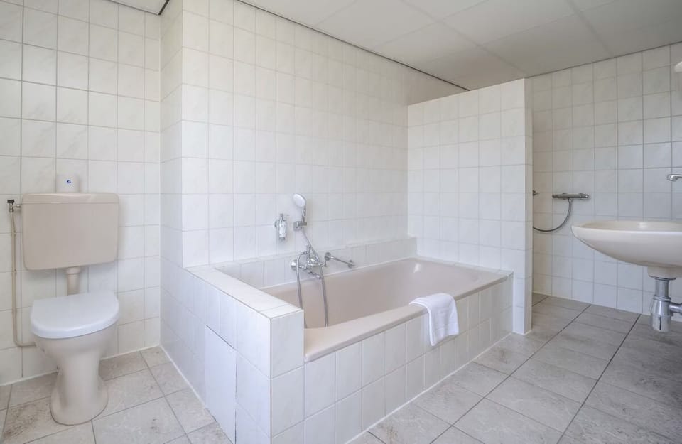 Refresh with a deep soak and enjoy a clean, spacious bath.