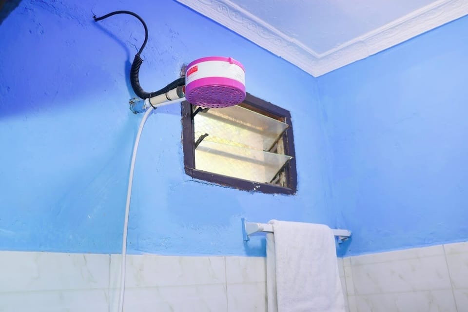 Double Room | Bathroom | Shower, free toiletries, slippers, towels