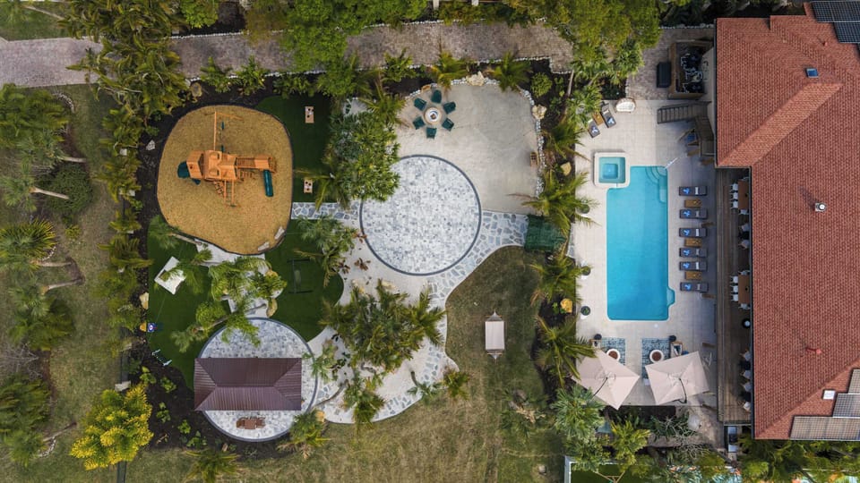 Outdoor Oasis: Dive into relaxation with poolside comfort and playful adventures in the yard!