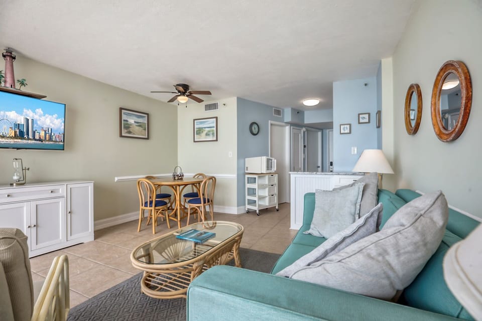 Spacious Living Area with Lounge, Flatscreen TV, and Ocean Views