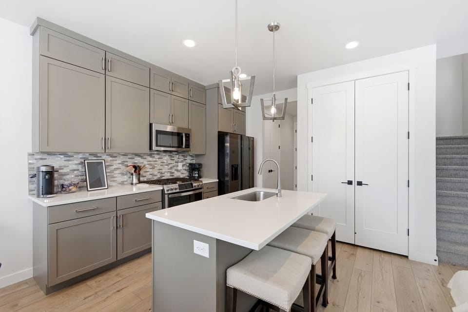 Well equipped kitchen with ample counter space and seating.