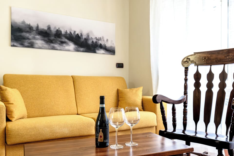 Deluxe Double Room, Park View | Living area | 50-inch Smart TV with digital channels