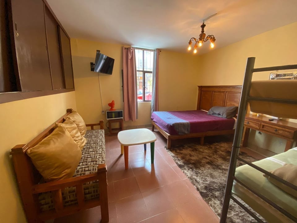 Family Studio Suite, City View | Desk, free WiFi, bed sheets