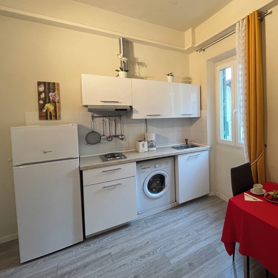 Kitchenette with basic essentials.