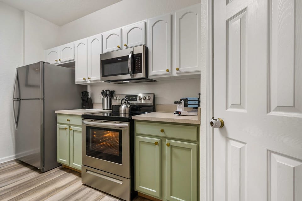 Fully equipped kitchen with stainless steel appliances