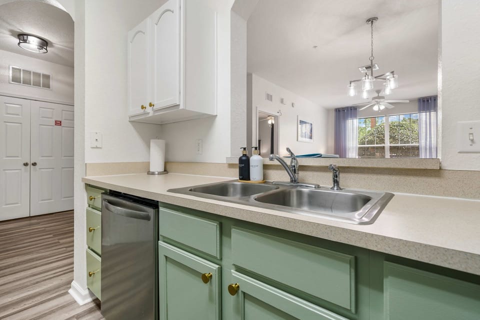 Breakfast bar and kitchen with open flow to dining area
