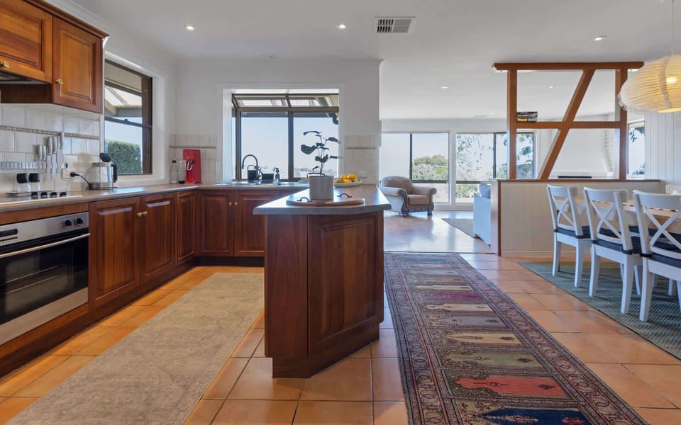 Open plan kitchen dining with plenty of space to prepare meals.