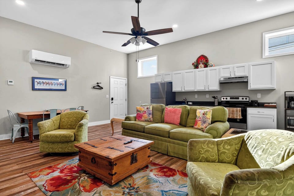 Living Room: Bright and inviting living room with cozy seating, natural light, and a relaxing ambiance perfect for unwinding after a day of exploring.