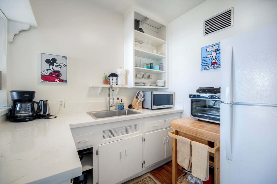 Kitchenette stocked for easy meals and coffee