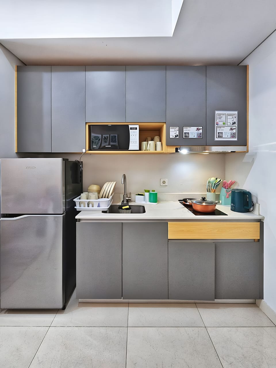 Fridge, microwave, stovetop, cookware/dishes/utensils