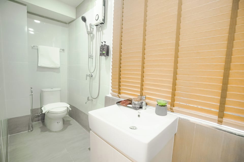 Hair dryer, towels, soap, shampoo
