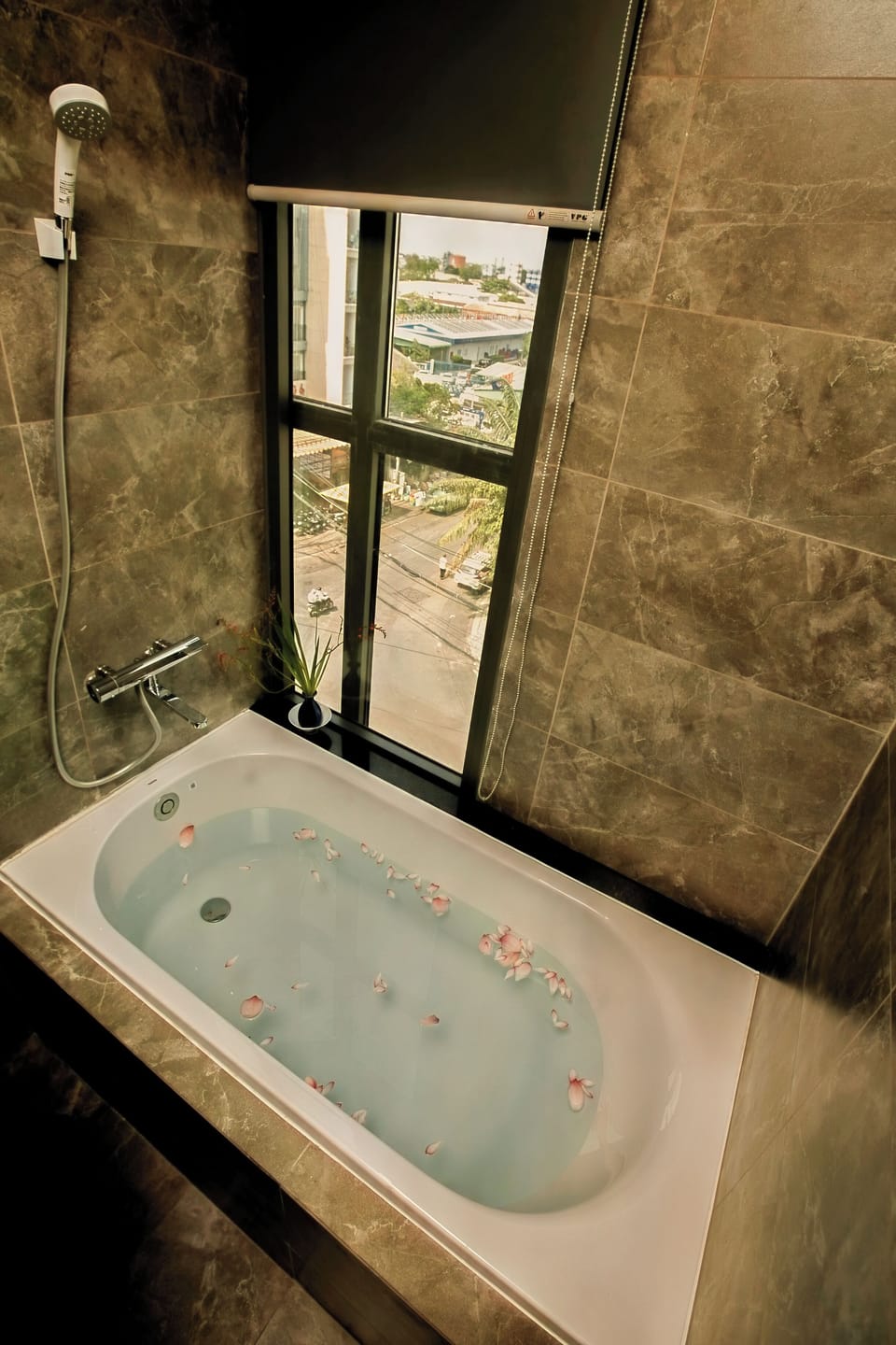 Suite, City View | Bathroom | Hair dryer, slippers, towels, soap