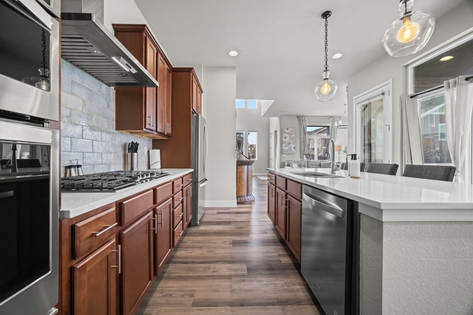Bright kitchen with plenty of counter space to cook together.