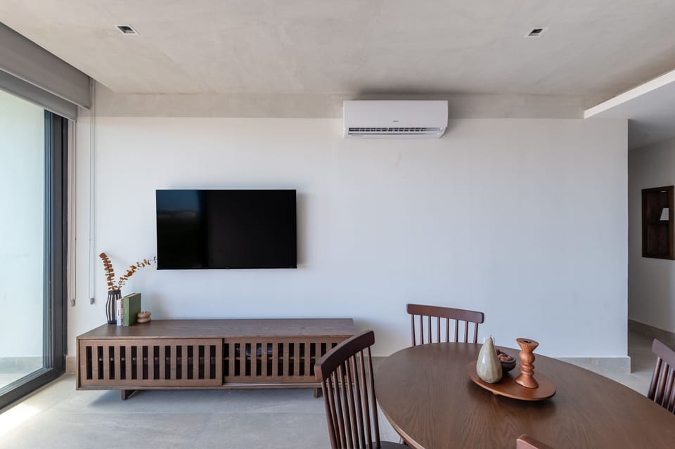 Dinning area and living room with TV