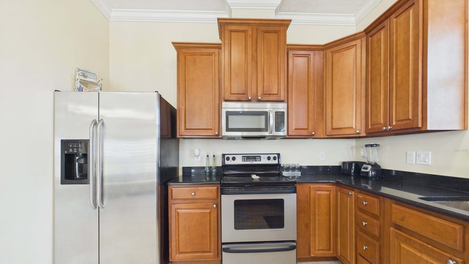 Full kitchen with stainless appliances and ll the cooking essentials for your culinary needs