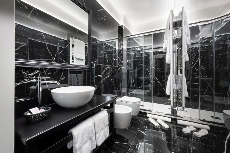 Shower, free toiletries, hair dryer, slippers