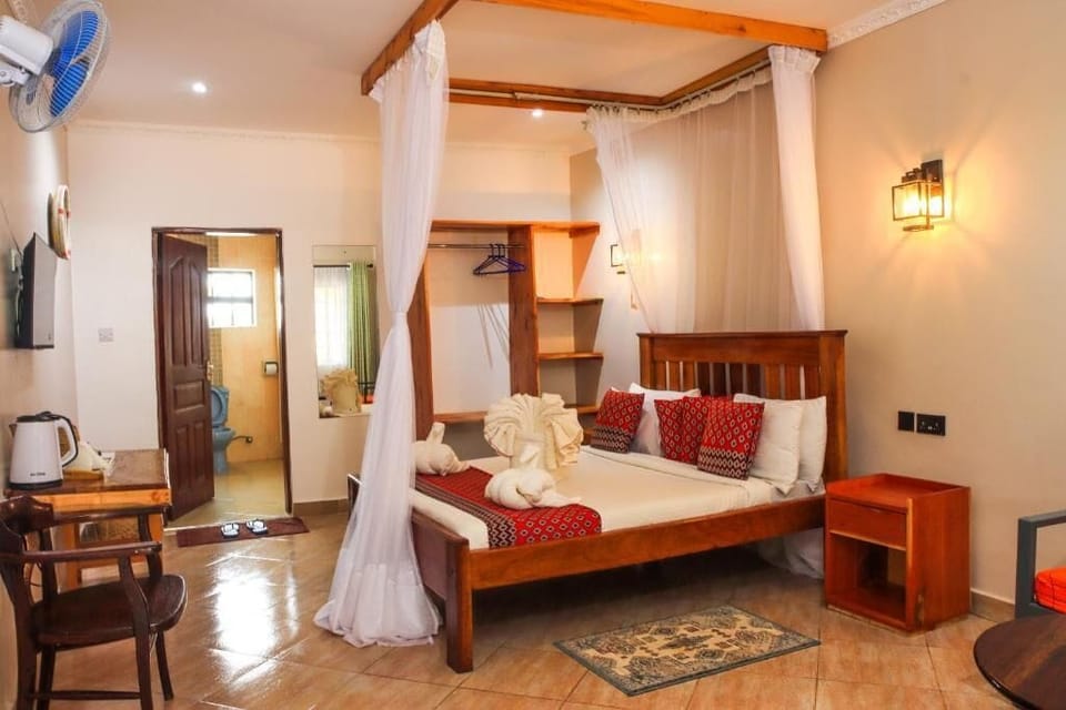 Superior Double Room, Garden View | Desk, iron/ironing board, free WiFi