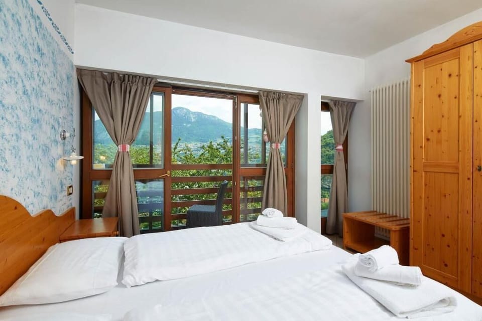 Triple Room, Balcony, Mountain View | Blackout drapes, iron/ironing board, free WiFi