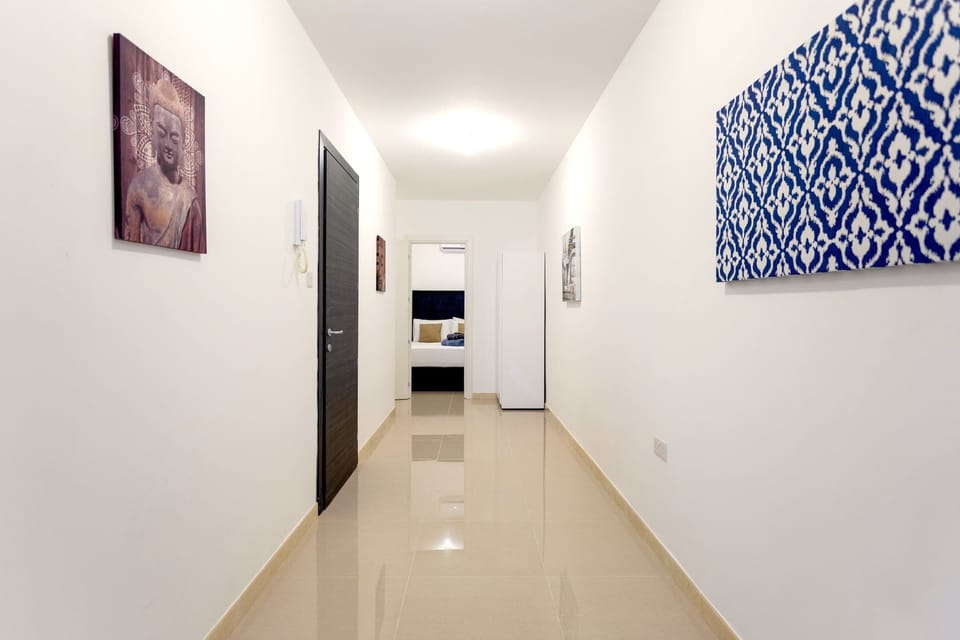 The hallway to the first bedroom