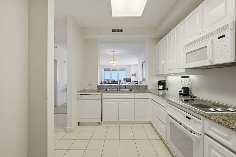 Beach Colony West 15C- Kitchen View to Living Room & Balcony