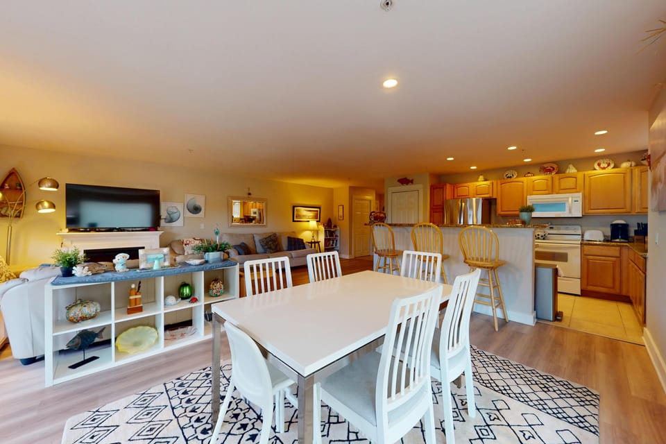 Large dining table with seating for the group.