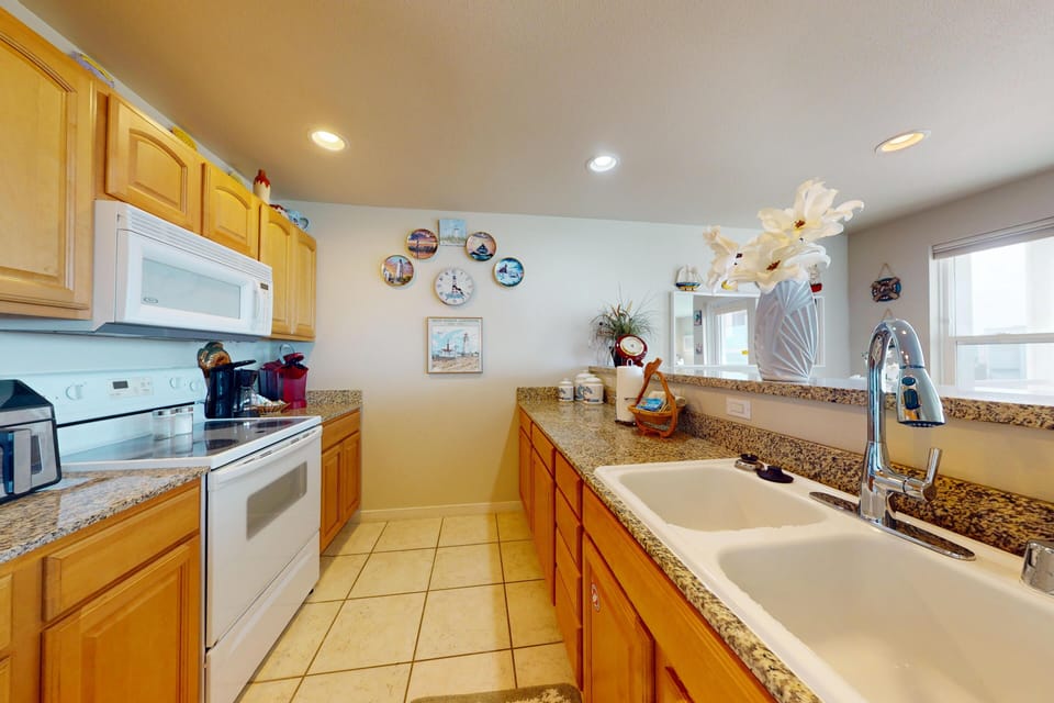 Fully equipped kitchen with everything you need to prepare meals during your stay.