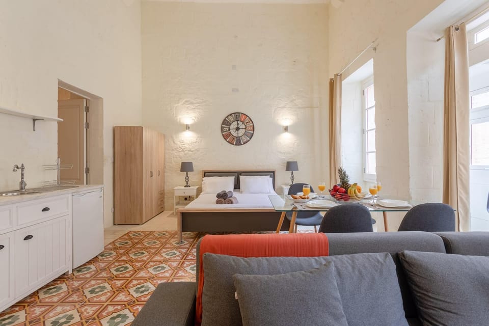 The open-plan living, bedroom, kitchen and dining area
