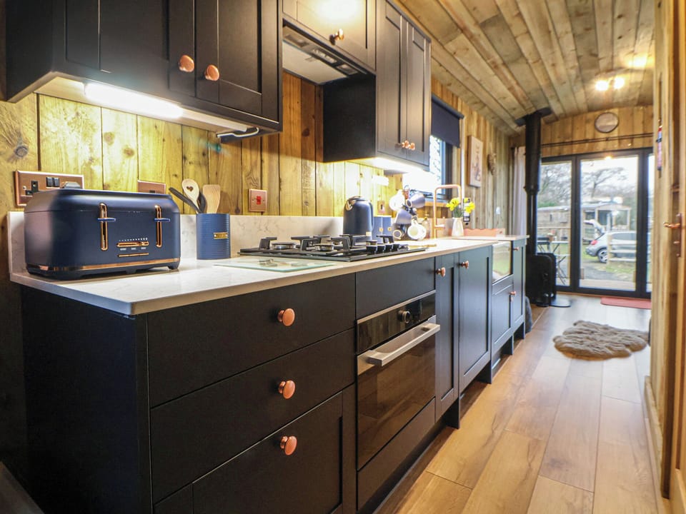 Fridge, toaster, cookware/dishes/utensils