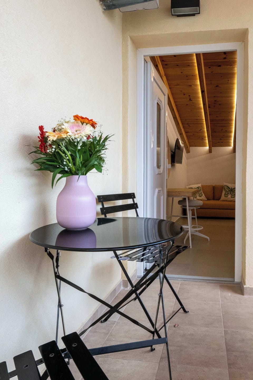 Balcony Dining Area with Table and Chairs