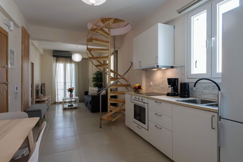 Fully Equipped Kitchen with Oven and Storage Cabinets