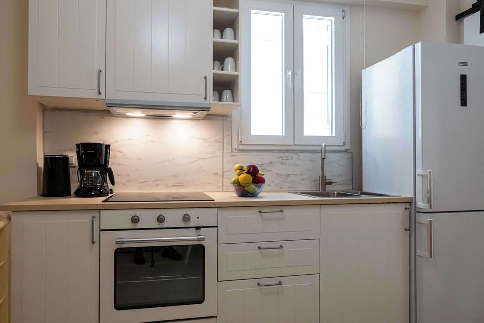 Modern Kitchen with Built-In Oven and Clean Finishes