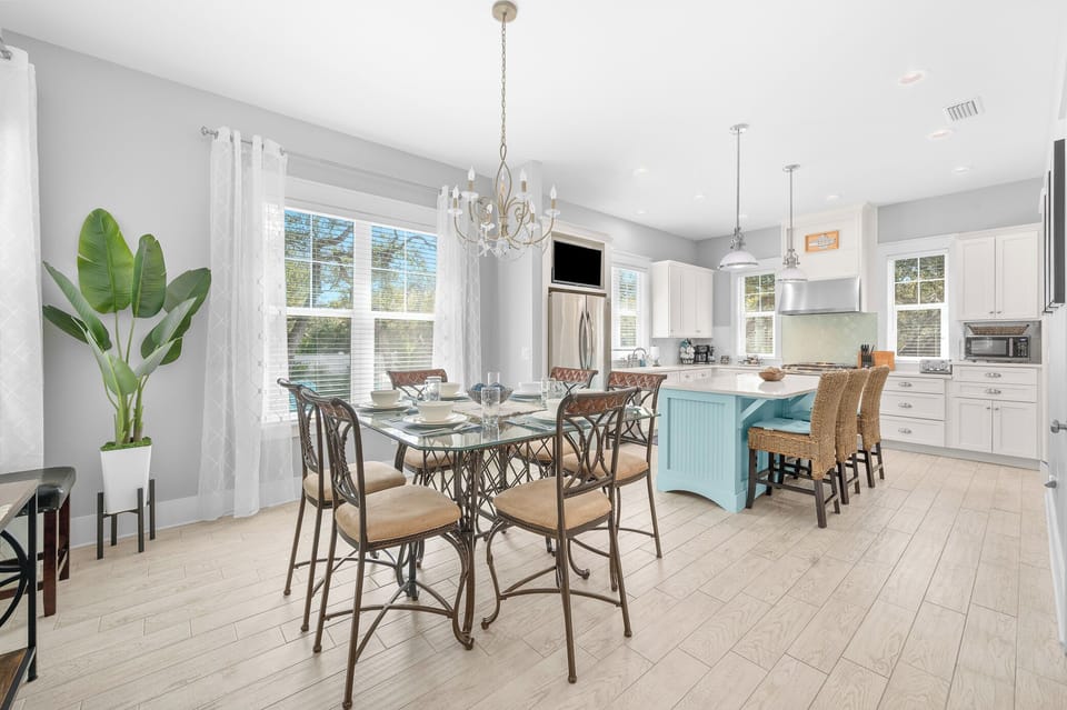 Bright dining area and kitchen with island seating