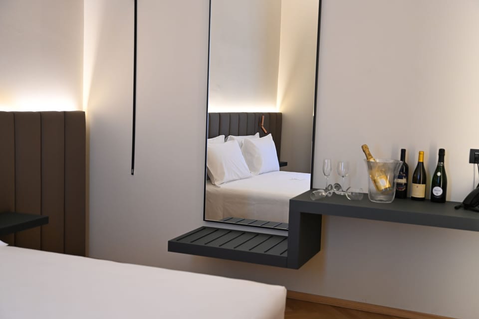 Premium Suite, Balcony, City View | In-room safe, desk, laptop workspace, blackout drapes