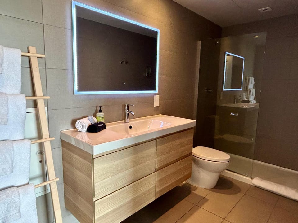 Premium Studio Suite, Harbor View, Lakeside | Bathroom | Hair dryer, towels, soap, shampoo
