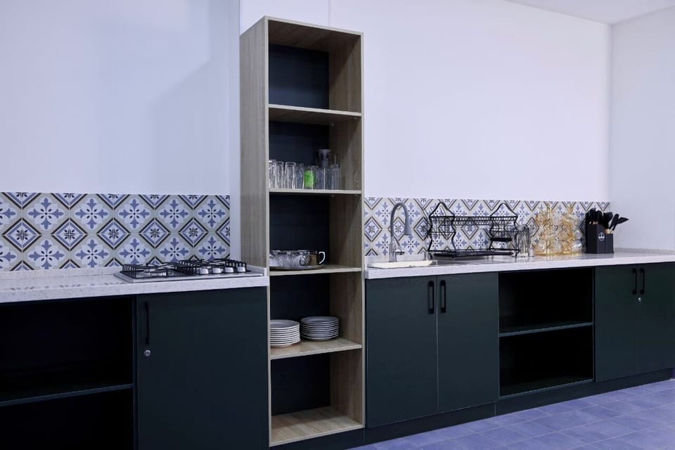 Full-size fridge, microwave, stovetop, rice cooker