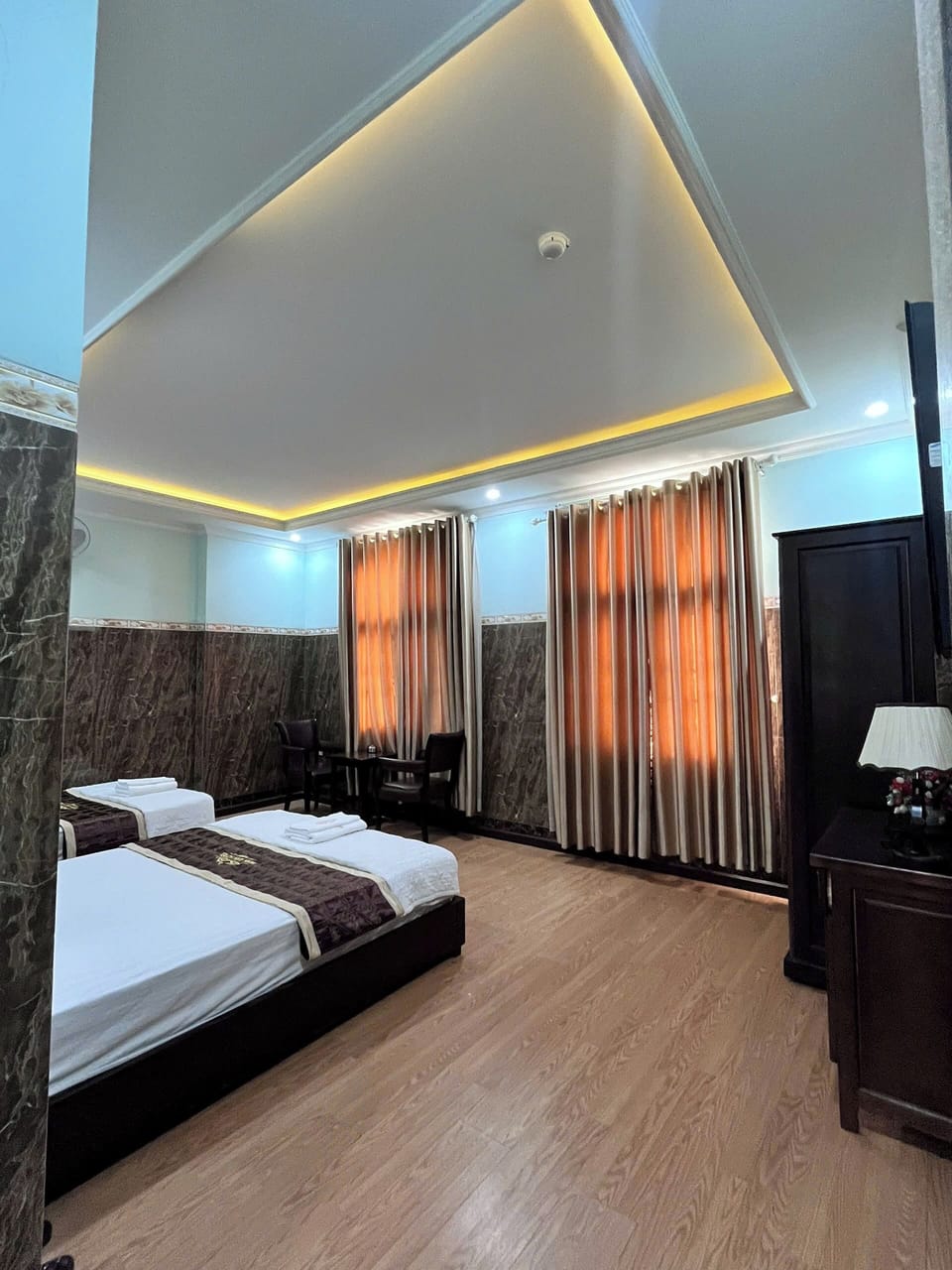 Basic Quadruple Room, City View | Desk, laptop workspace, free WiFi