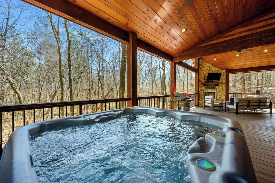 Your ultimate outdoor retreat – hot tub, fireplace, and entertainment all in one