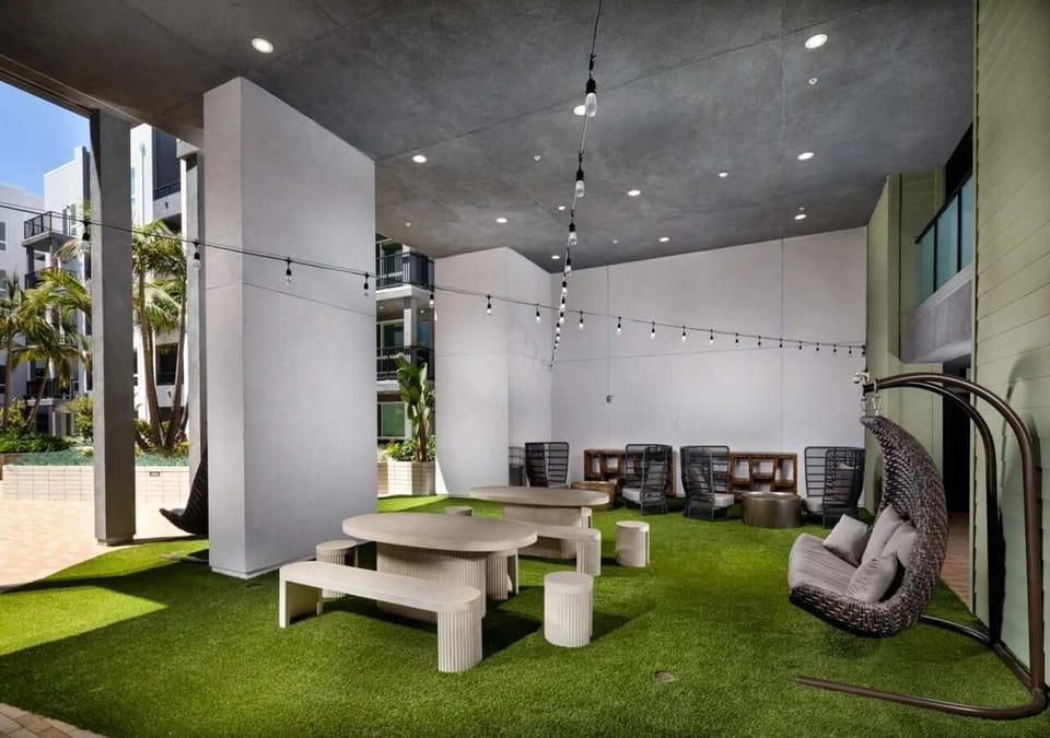 Community courtyards featuring outdoor seating and inviting gathering space