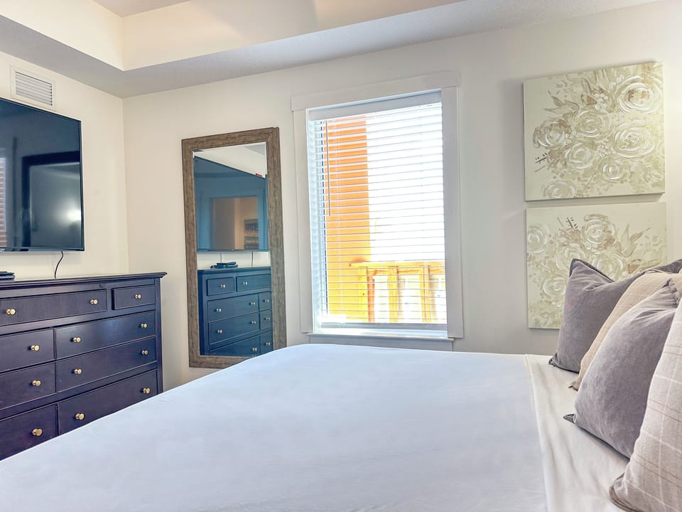 Bedroom with king bed & private bathroom