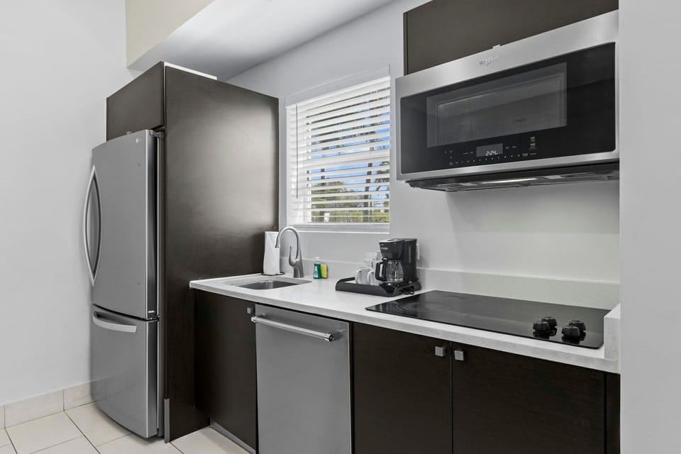 Well-designed kitchenette providing everything needed for light meals and snacks.