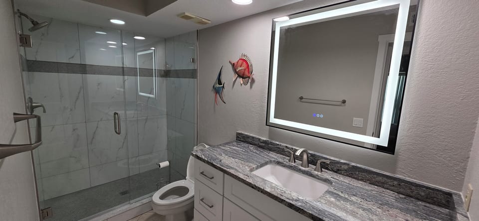 Walk in shower and large vanity in the Guest Bath