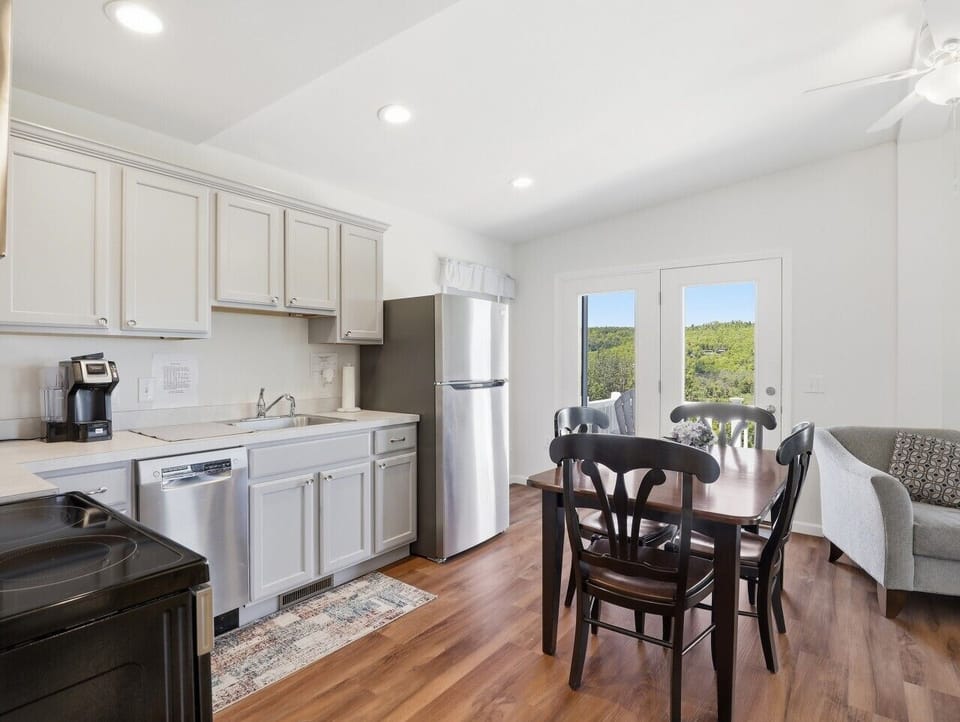 Kitchen & Dining Area | Stainless Steel Appliances | Mountain Views & Dining Table