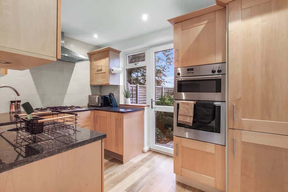 Gourmet Kitchen: Cook up a feast in this sunlit space with sleek finishes and modern appliances!
