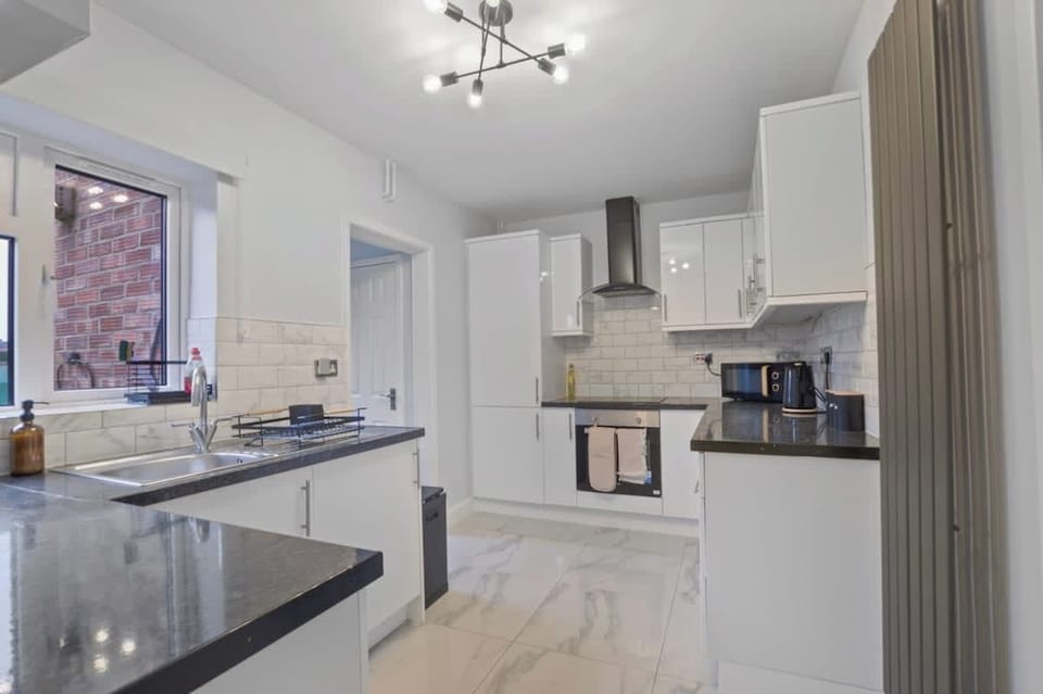 Fully Equipped Kitchen: Modern kitchen with everything you need to cook and prepare meals during your stay.