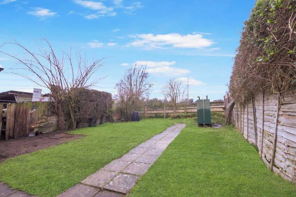 Private Garden: Enjoy the spacious outdoor garden area, perfect for relaxing during your stay.