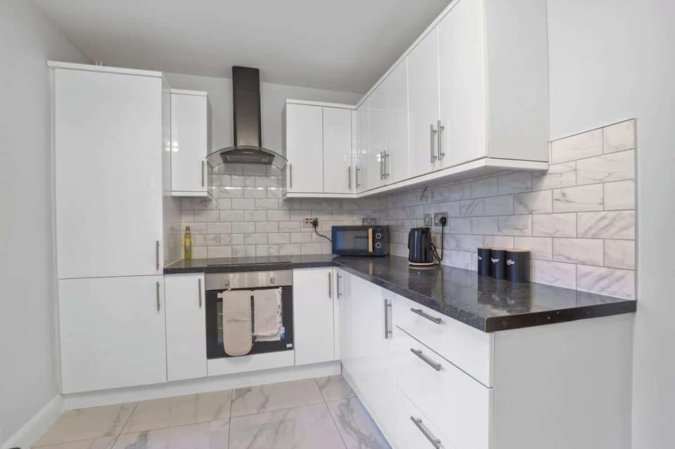 Fully Equipped Kitchen: Modern kitchen with everything you need to cook and prepare meals during your stay.
