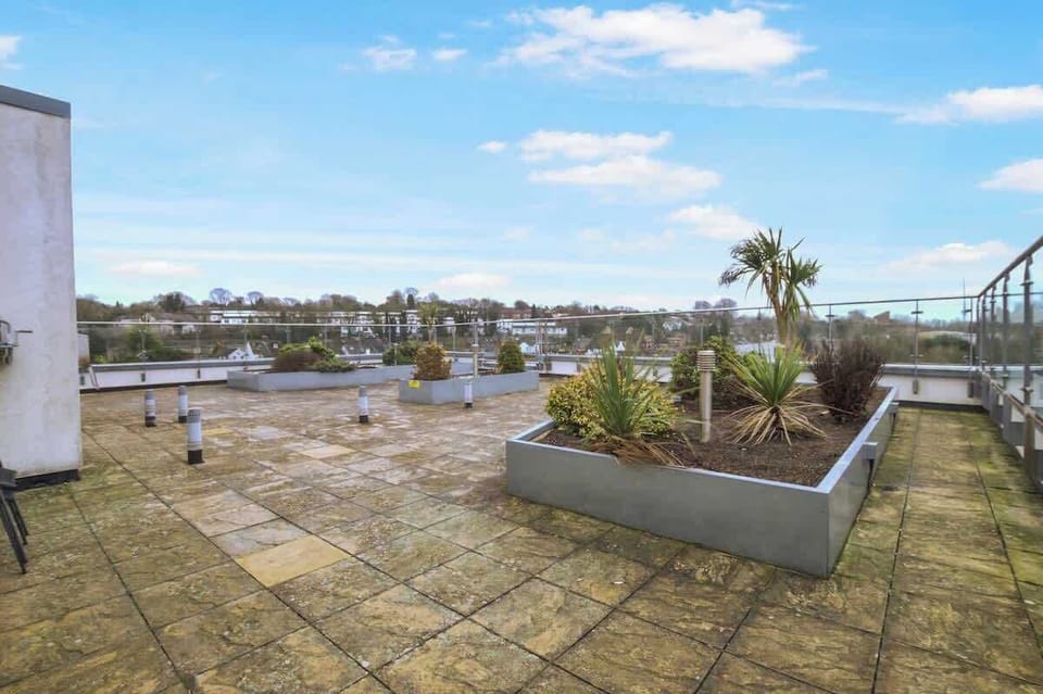 Rooftop Terrace: Enjoy access to the shared rooftop terrace with open views.