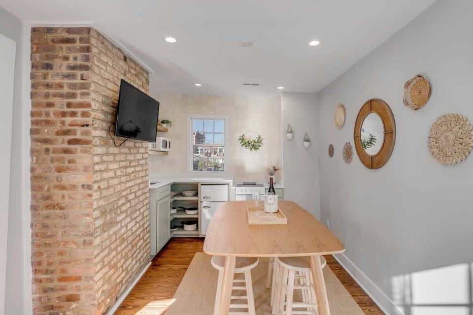 Spacious dining area with seating for 6, perfect for shared meals and conversation.