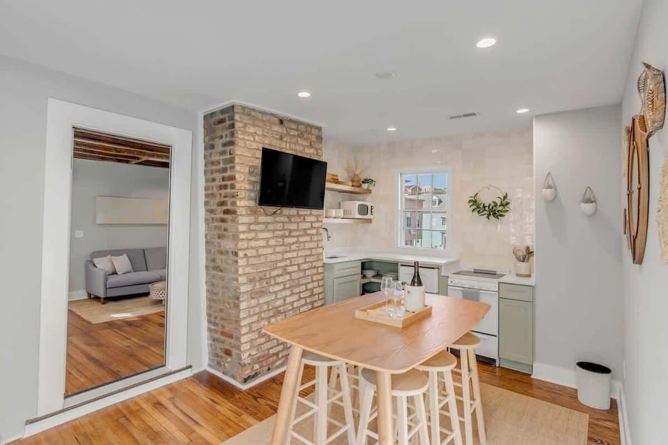 Spacious dining area with seating for 6, perfect for shared meals and conversation.