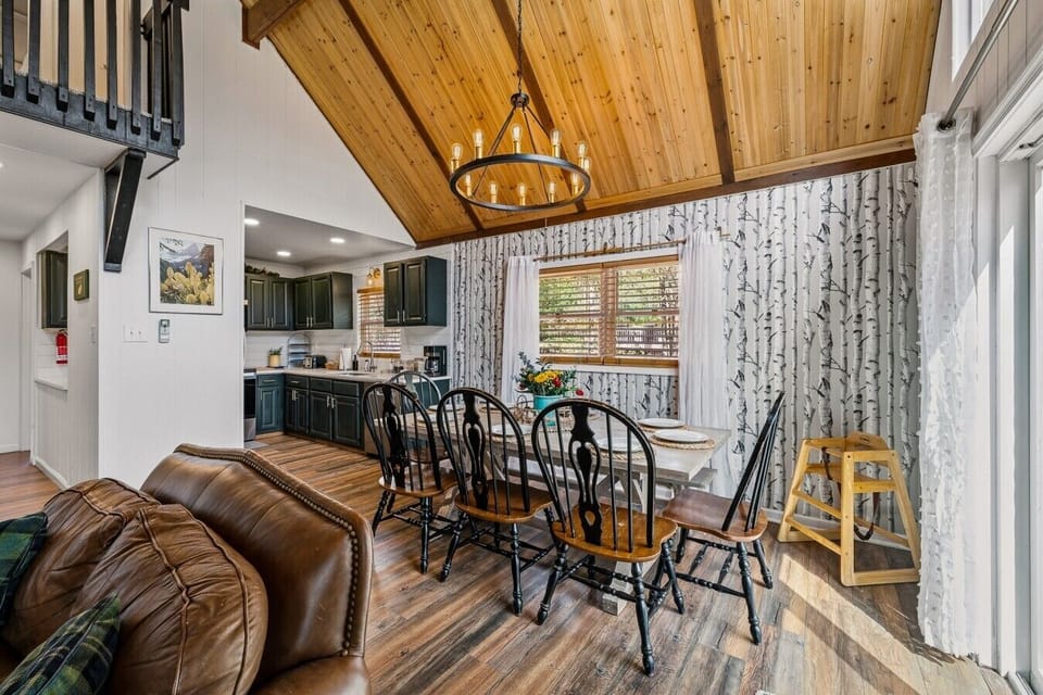 Dining Area | Chandelier & Wooden Table | Sliding Glass Door